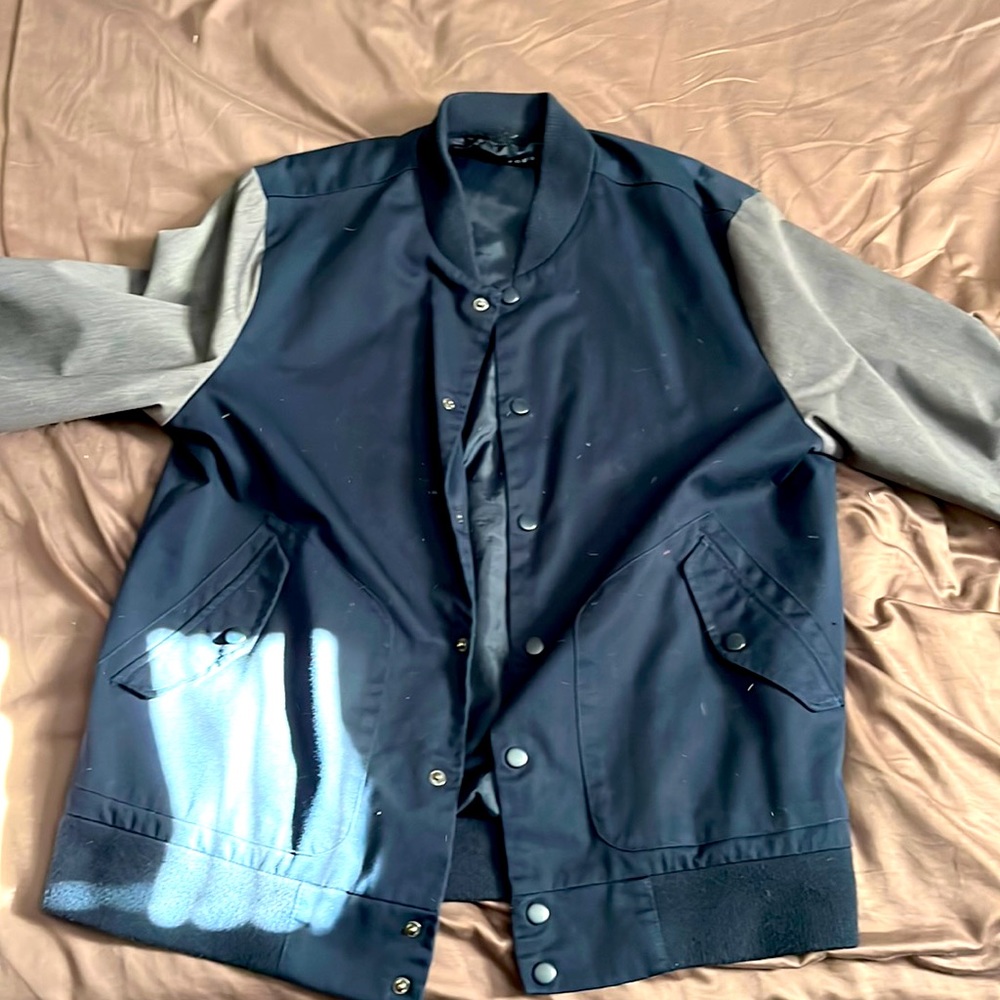 Brand is Five Four size large button up coat. It is navy blue with gray sleeves